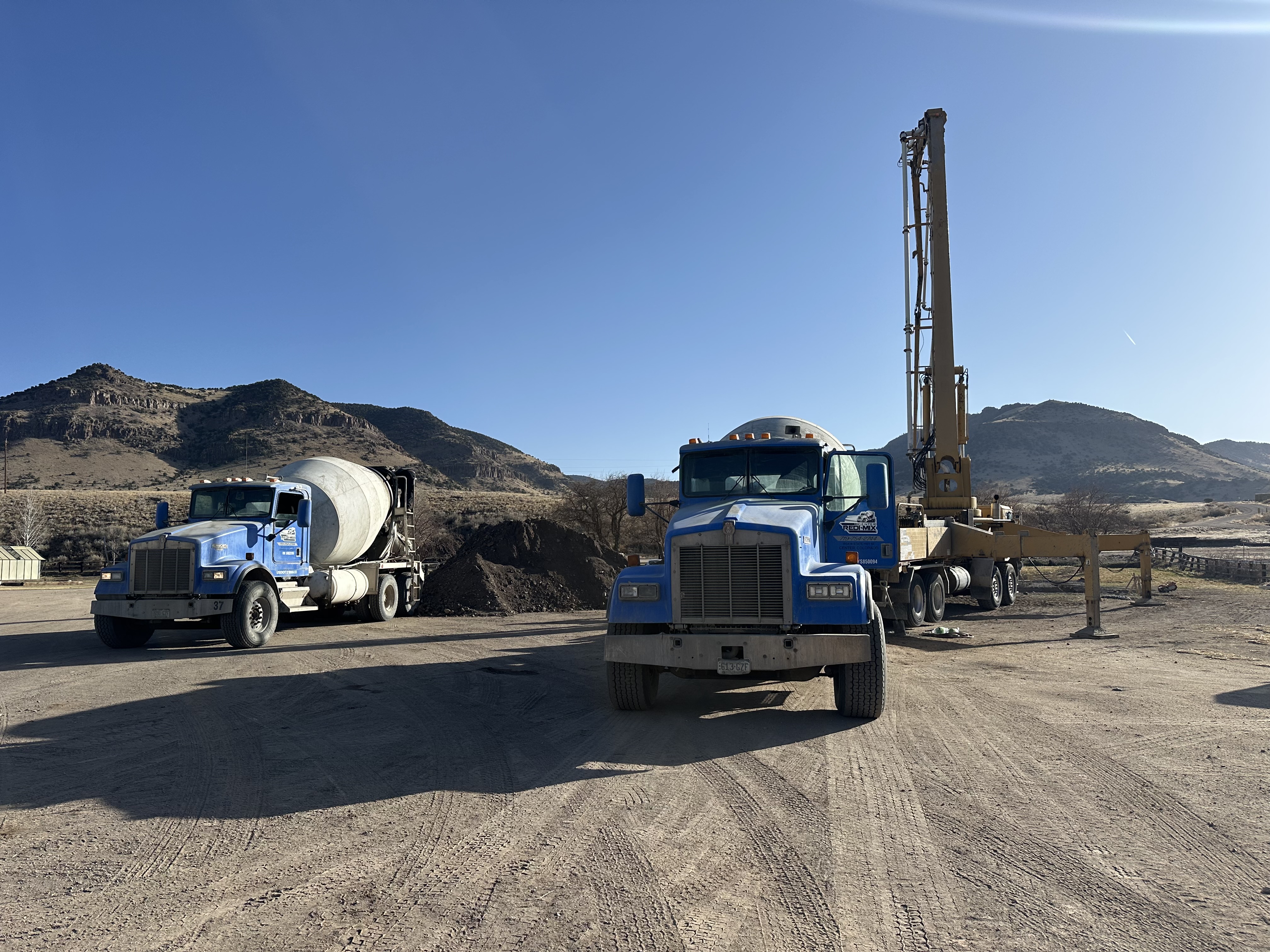 Mixer trucks and pump truck at the Center Redi-Mix yard